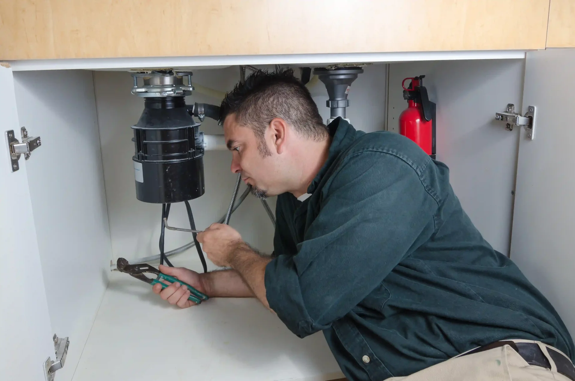 Why Your Garbage Disposal Smells | Johnny Rooter Plumbing